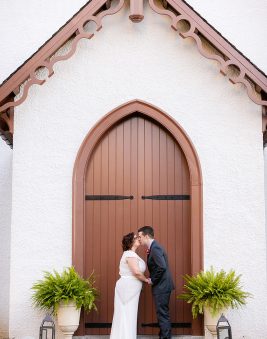 Bride and Groom in Doorway at Lincoln Cottage. Howerton+Wooten Events.