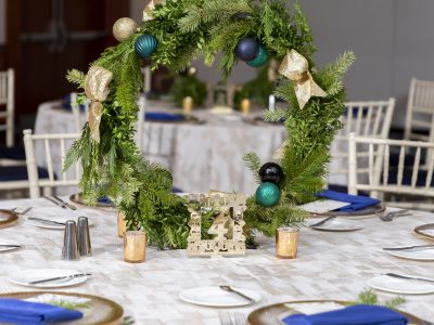 Green Wreath at Corporate Holiday Party. Howerton+Wooten Events.